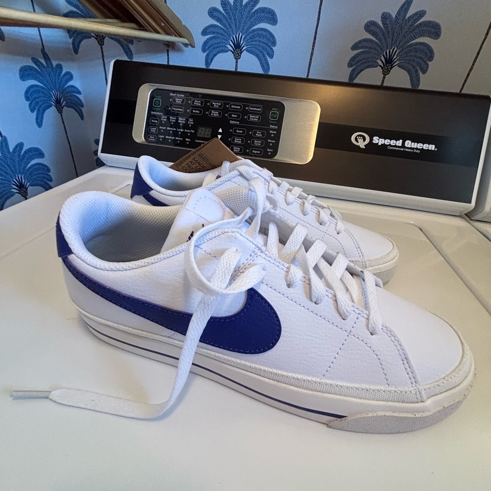 Nike women’s White and Navy Sneakers